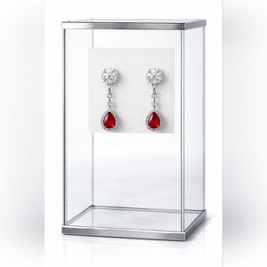 Silver plated ruby teardrop earrings.